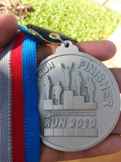 'medal 12k finisher'